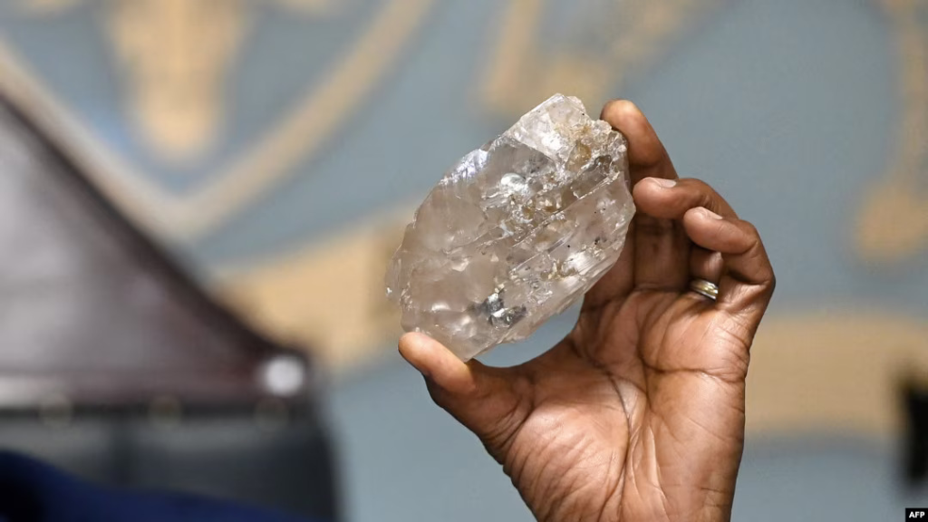 Botswana president holding second largest diamond in the world