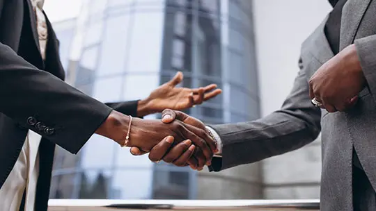 two men shaking hands